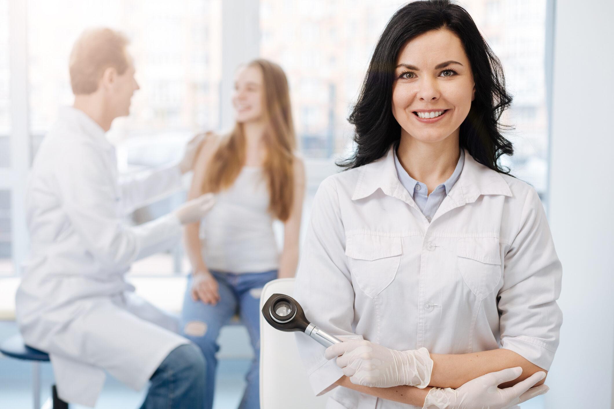 dermatologist and consultation in the background